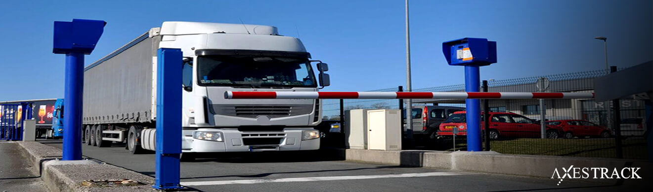Truck entering a secured logistics facility through an automated gate, representing gate automation in high-traffic logistics zones